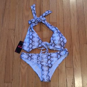 Shekini Swimwear two piece swimsuit. Size small.